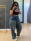 New casual fashion trend for women's clothing, distressed washed blue jeans, straight leg pants