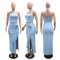 Solid color side opening ruffle skirt paired with lace up sleeveless top
