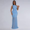 Fashionable women's dress with sloping shoulders and sexy perspective solid color dress