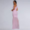 Fashionable women's dress with sloping shoulders and sexy perspective solid color dress