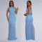 Fashionable women's dress with sloping shoulders and sexy perspective solid color dress