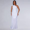Fashionable women's dress with sloping shoulders and sexy perspective solid color dress