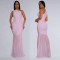 Fashionable women's dress with sloping shoulders and sexy perspective solid color dress
