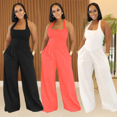 Fashion women's casual wide truffle back hanging neck solid color jumpsuit