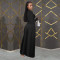 Fashionable women's dress with a cinched waist and crossed collar, long sleeved dress