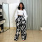 Fashionable casual and comfortable two-piece set with long sleeved top and loose printed wide leg pants