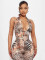New wild and elegant deep V-color contrasting hanging neck strap backless leopard print jumpsuit