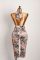 New wild and elegant deep V-color contrasting hanging neck strap backless leopard print jumpsuit