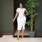 Fashionable pearl short sleeved casual dress with slit design for women's clothing