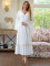 Casual long sleeved white V-neck dress, mid length skirt without waistband