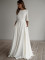 Elegant and minimalist round neck wedding dress with three quarter sleeves