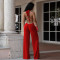 Fashionable women's sexy lace up backless solid color hip hugging jumpsuit