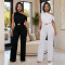 Fashionable women's clothing with elegant sloping shoulder belt and solid color jumpsuit