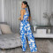 Hanging neck sleeveless top with printed waistband jumpsuit
