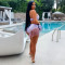 Fashionable women's sexy neck hanging and strapless outfit with tassel shorts set