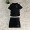 Two piece top with distinctive short skirts on both sides, drawstring and logo