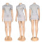 Two piece top with distinctive short skirts on both sides, drawstring and logo