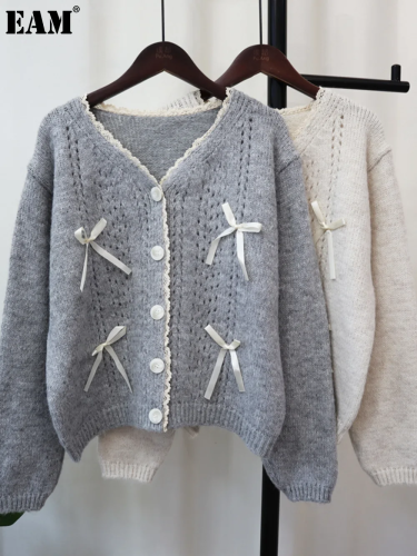 {EAM} Hollow bow knit cardigan 2024 autumn and winter Korean version of loose V-neck sweet soft waxy sweater coat women DLZ104