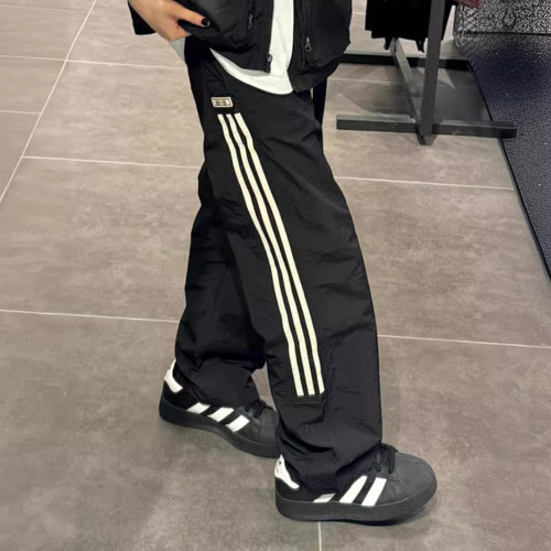{EAM} Side stripes three bars overalls women's thin fashion brand sports loose straight leg casual pants DLZ219