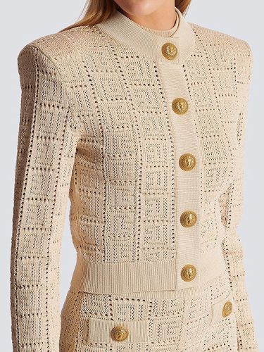 {EAM} Spring and autumn new long sleeve short round neck hollowed out sweater top fashion cardigan coat lady DLZ238