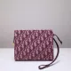 Dior oblique Clutch in embroidered canvas DMZ9102703
