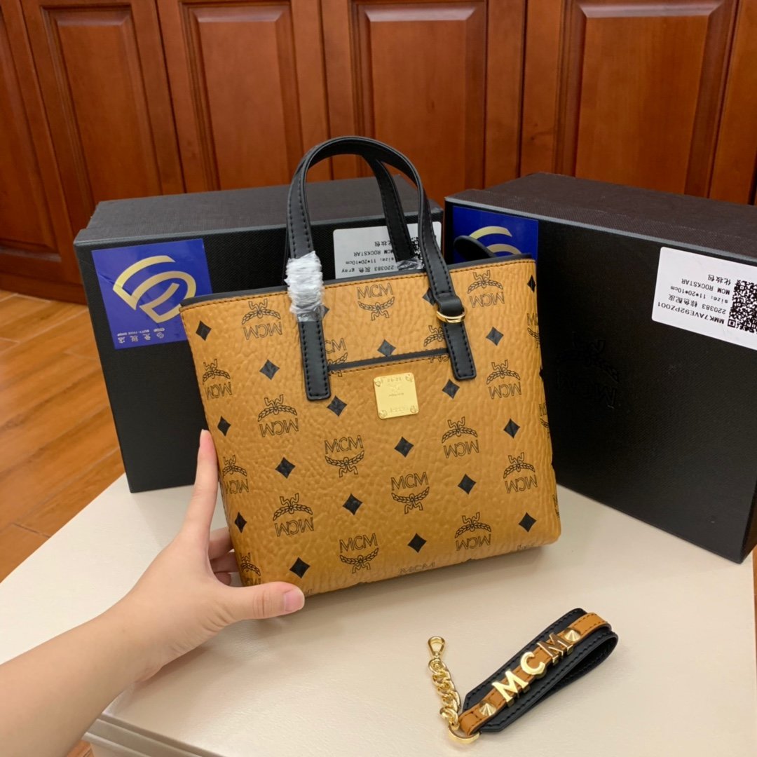 mcm mini sling backpack