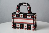 Dior mini book tote in embroidered canvas DMZ22040903