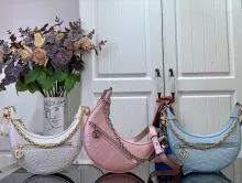 Louis vuitton monogram the Loop handbag is a half-moon baguette MX24092508