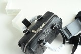 Gucci GG Marmont mini top handle bag EY24101910