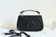 Gucci GG Marmont mini top handle bag EY24101904