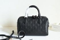 Gucci GG Marmont mini top handle bag EY24101908