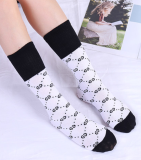 G letter tide brand spring and autumn winter Korean version of the knee under the tube cotton pile socks fashion wild calf female socks