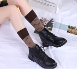 G letter tide brand spring and autumn winter Korean version of the knee under the tube cotton pile socks fashion wild calf female socks