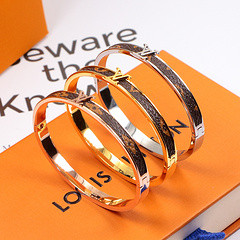 Wild temperament letter titanium steel 18K rose gold silver white two-color matte bracelet European and American women
